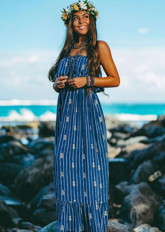 The Moana Long Hawaiian Dress Pineapple Print is a tribute to the Islands of Hawai’i and the oceans that surround it. It is no surprise that the Angels By The Sea Hawaii exclusive Moana Long Hawaiian Dress Pineapple Print is so popular among our guests.