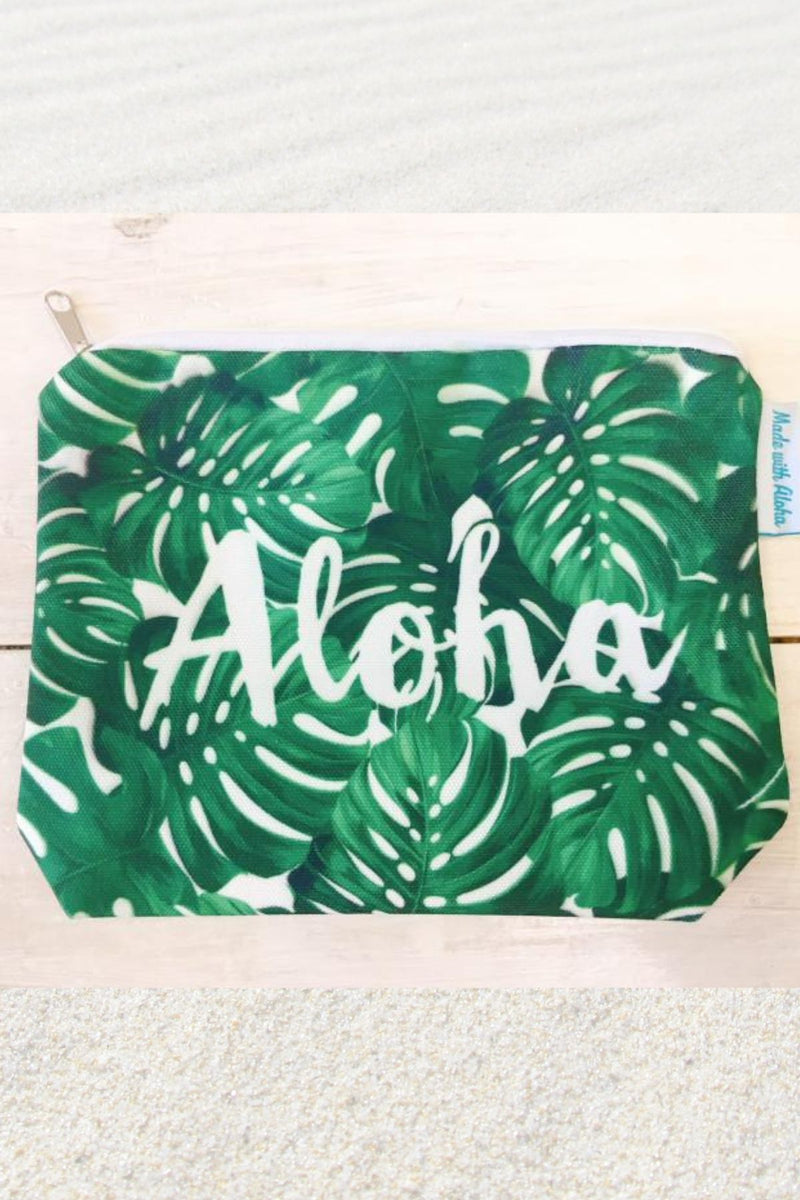 Zippered pouch with leaves and the word Aloha