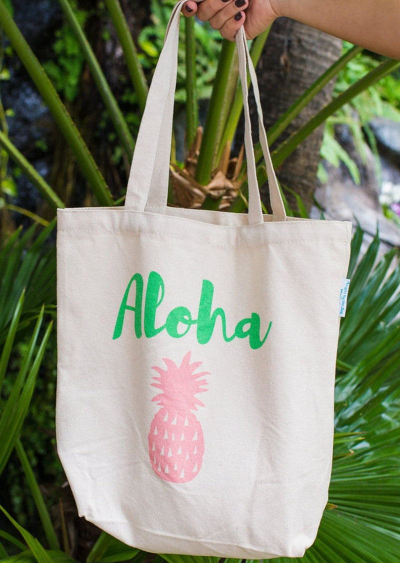 Large Cavas Hawaiian tote with Pink Pineapple under the word Aloha.