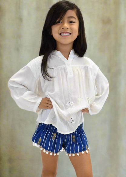 Girls Shorts with Navy Pineapple and Pom Pom on bottom