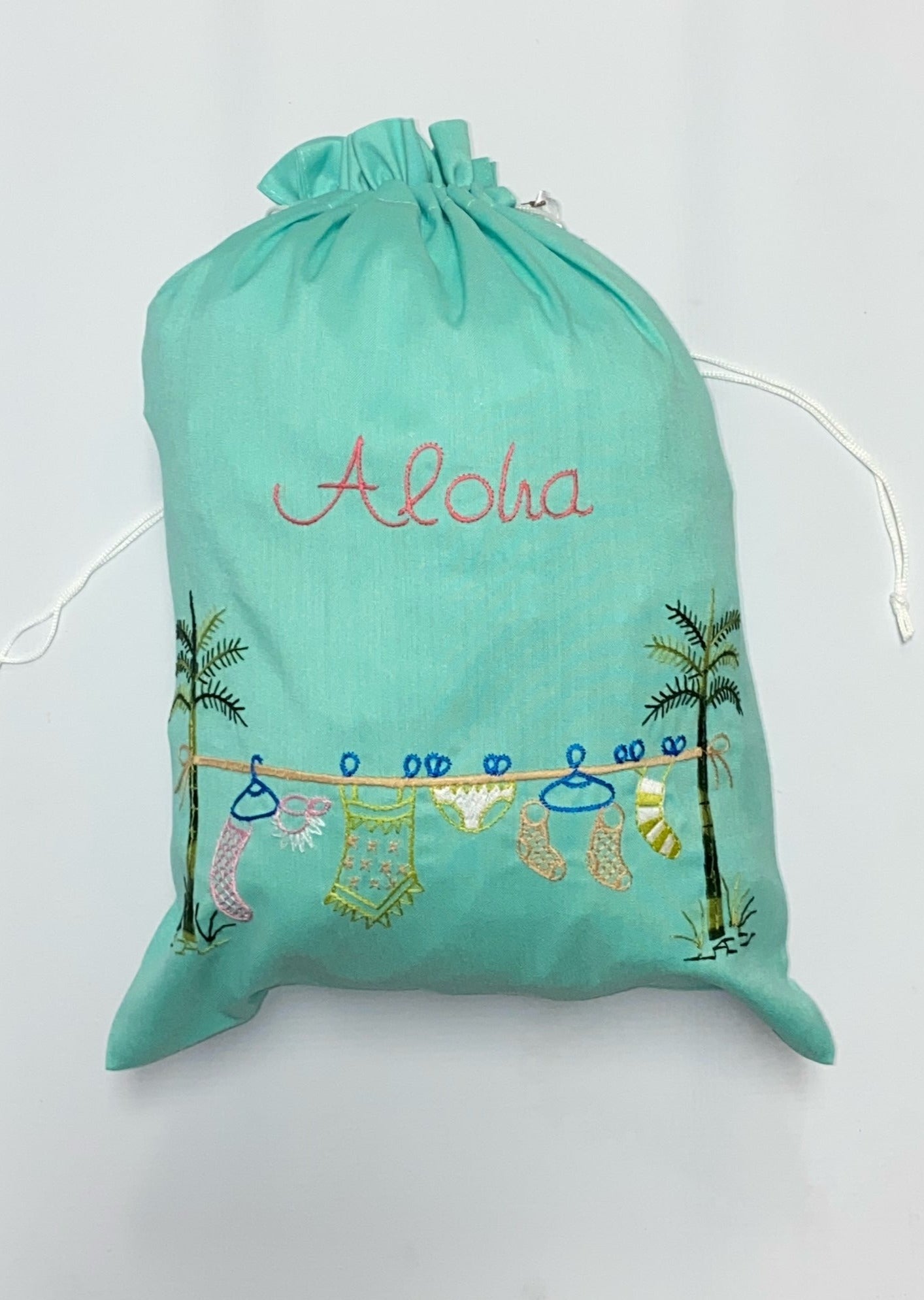 Clothesline Embroidered Travel Sack